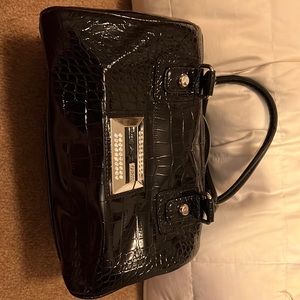 Guess satchel in black faux exotic skin.  12”Lx7”Wx7”H